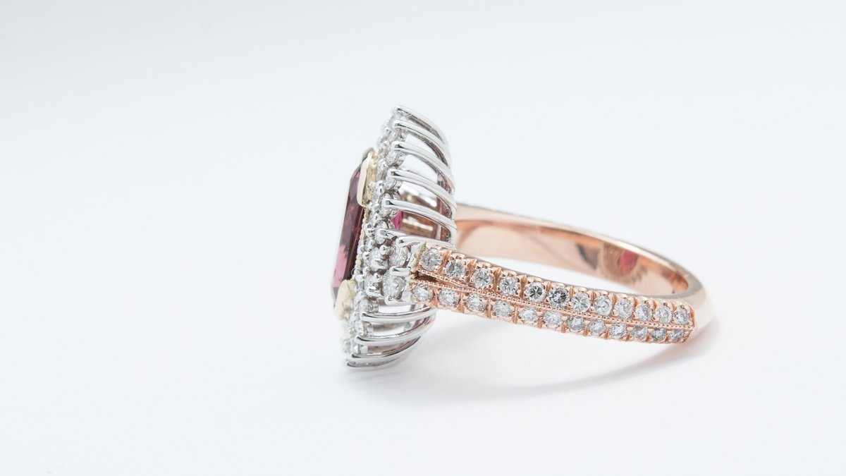 One of many rings we have produced over the years. This beautiful rubellite tourmaline set in yellow gold, with white gold halo of diamonds and rose gold shank with diamonds - How can you not love this ring?
#rings #gold #gemstones #diamonds #jewelrydesign #finejewelry #bling