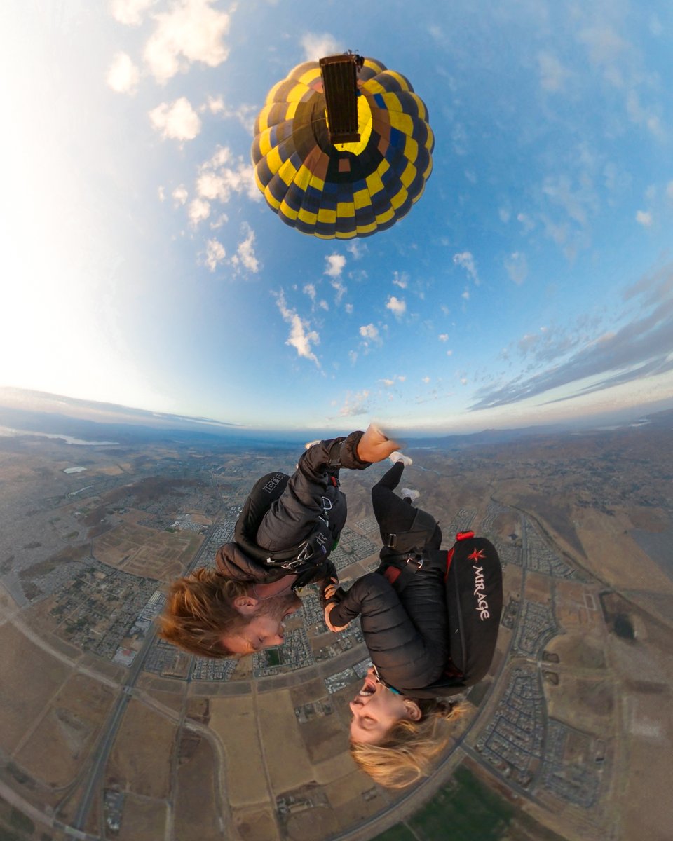 GoPro's tweet photo. Photo of the Day: Falling in love 🪂 Subscriber Brooks Baxter + Lily Lewis shared a sunrise skydive + scored a $500 award for this #GoProMAX photo.

#GoPro #GoProSelfie #Skydiving #HotAirBalloon #Selfie #Skydive https://t.co/iXEnEOb4Ed