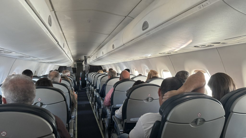 Very meta: me on an <a href="/AmericanAir/">americanair</a> flight that is showing @happycampersdoc on the in-flight!