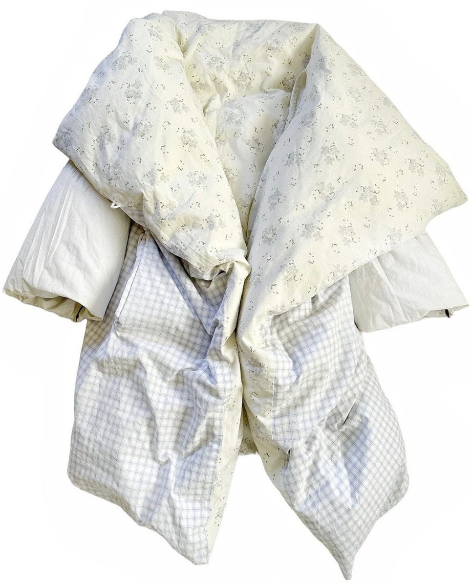 this margiela duvet coat looks so inviting especially in this weather...