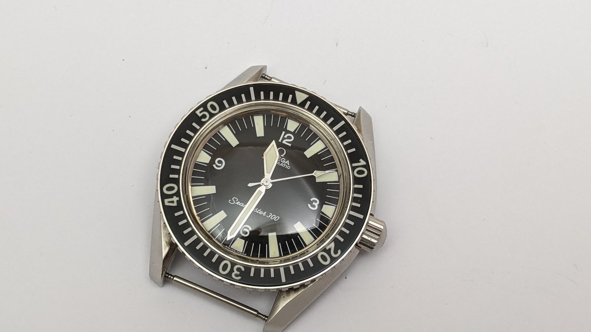 armstrongwatch's tweet photo. Omega Seamaster 300 in for a service (WatchCo build).  Based on the original 165.024 of the 1960s, it's a controversial watch, due to the way it was constructed and sold unofficially from Omega genuine parts supply. Full service done for the calibre 552. https://t.co/deWW4a2EyE