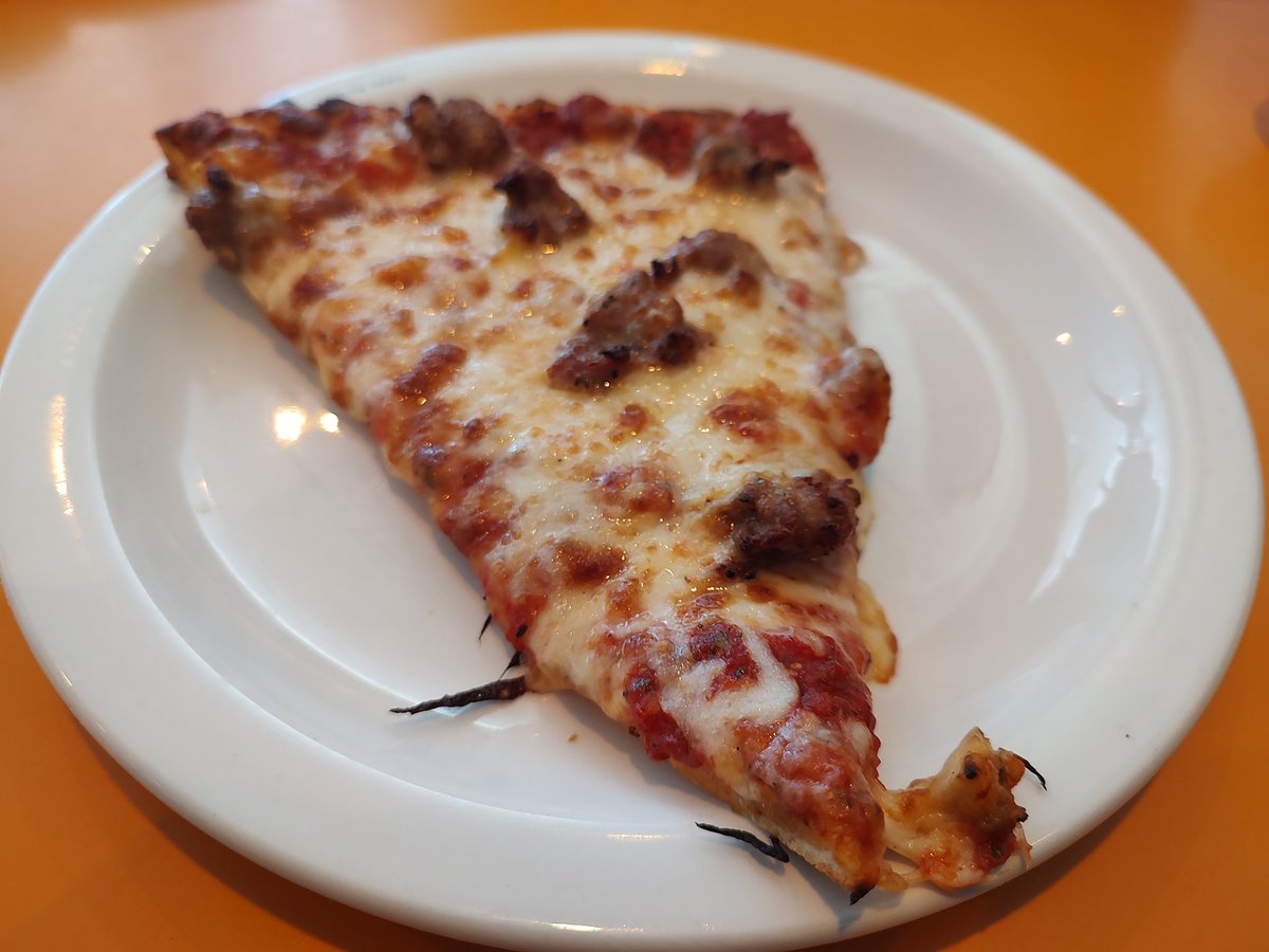 Lunch special. Salad, slice and drink for 9 bucks and change   from <a href="/puccinis_pizza/">Puccini's Pizza Pasta</a>    we love this place.