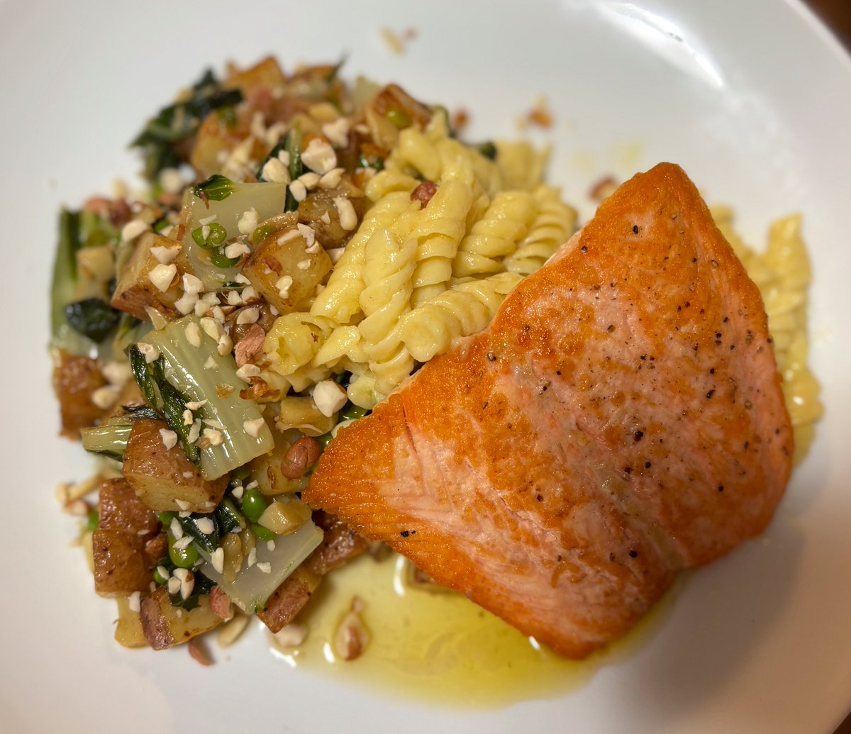 Salmon with fried potatoes, bok choy, roasted garlic and peas, topped with crushed peanuts.

Rotini pasta in a buttery creamy homemade sauce.

Smash or pass!?