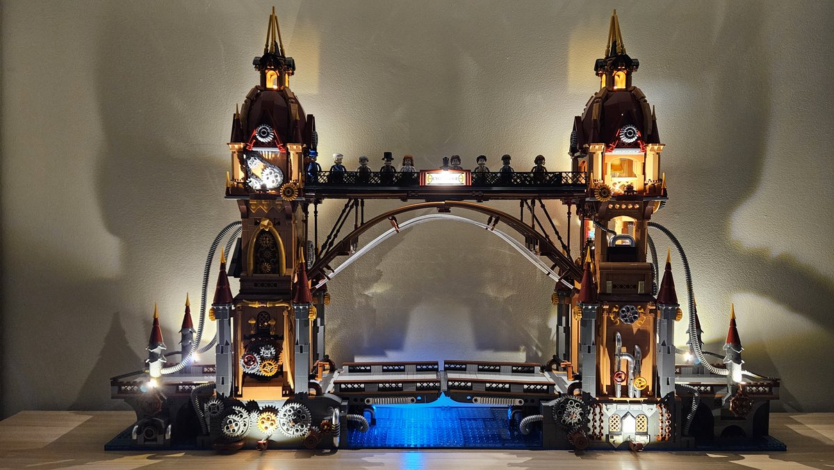SheClicksBricks's tweet photo. This is a taste of the FunWhole Steampunk bridge. 3107 pieces and of course lights. Check out our review of this set. https://t.co/5fZPeteRsy You don't want to miss this. #funwhole #steampunk #lego #afol https://t.co/iZcAeASCyy