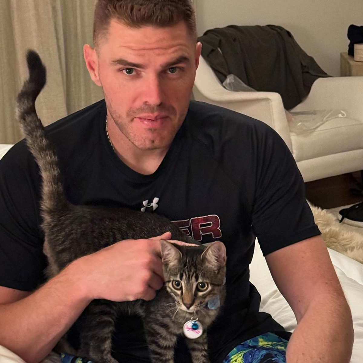 MLB's tweet photo. Freddie Freeman and his family adopted a cat after the World Series and they named him Champ 🥹❤️ https://t.co/7GYCvJVdzB