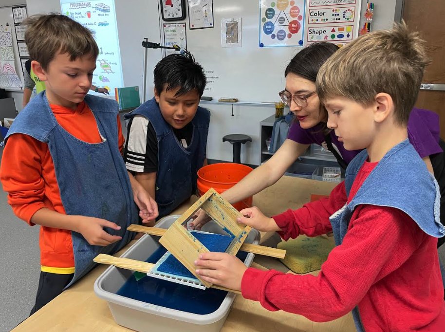 Last month, Carleton College Assistant Professor of Art, Jade Hoyer, and her students taught Greenvale Park students to make handmade paper for a paper quilt that will be installed permanently in the school.