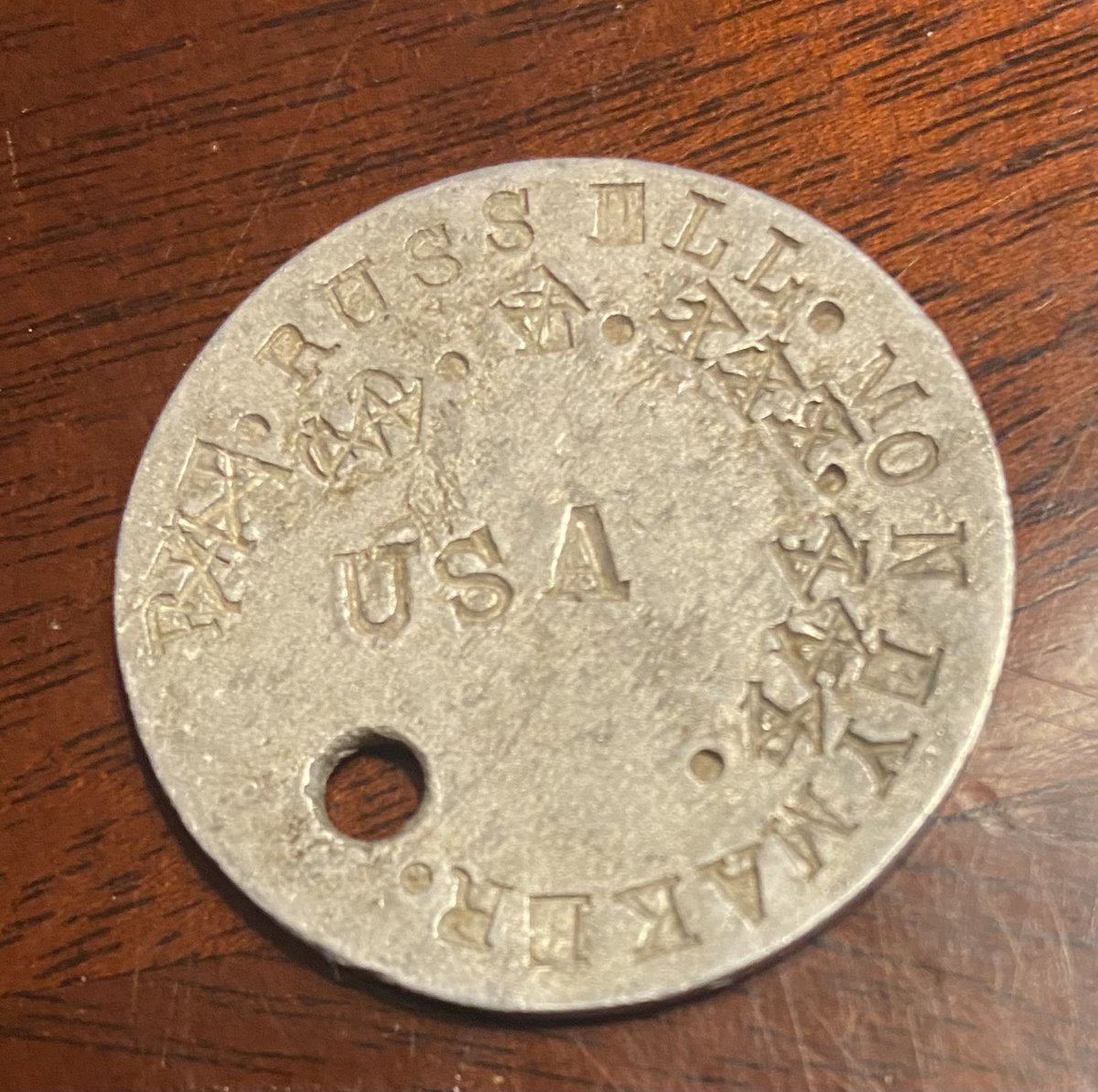 A World War I Dog Tag, belonging to Russell Moneymaker,  passed down in our family to me.