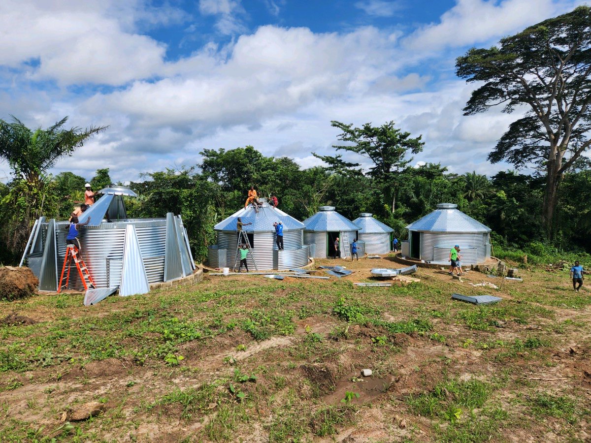 MarkGaalswyk's tweet photo. Hi $DUTV Team…Today, as part of our “Feed The Famished Project,”  we sent many bottles of Terreplenish to a farmers  in Liberia. The bottles “hitched a ride” in a shipping container loaded with grain bin type little houses, joining the houses already there shown in photo. https://t.co/PUP0a3cOTZ