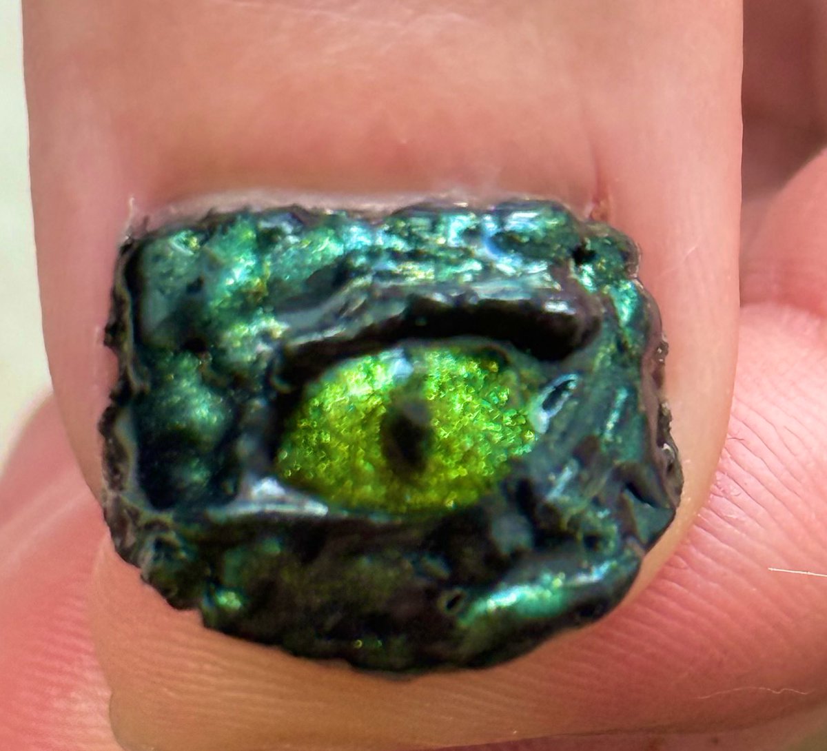 heuwer's tweet photo. First try at doing 3D nails. Way too thick but at least I finished. #LizardMinnelli #3D #nailart https://t.co/XmmjVUdFr0