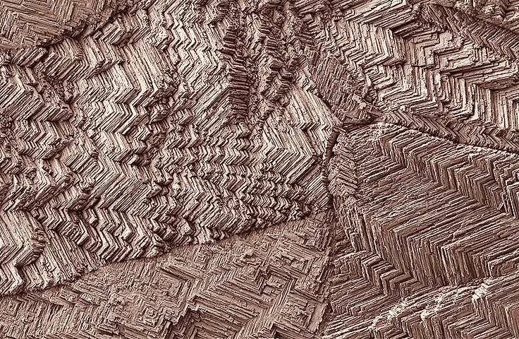microscopicture's tweet photo. copper surface of a penny magnified 2,500x https://t.co/UAyvXqcnEn