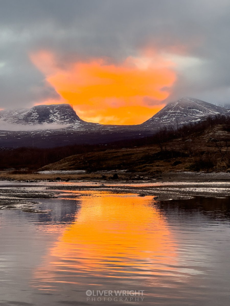 This mornings hike I thought no sunrise as there a bank of clouds to the east so I only took a long lens

Then as I got down to the lake this crazy atmospheric effect happened through Lapporten (Čuonjávággi) with the gates of the mountain making a huge shadow