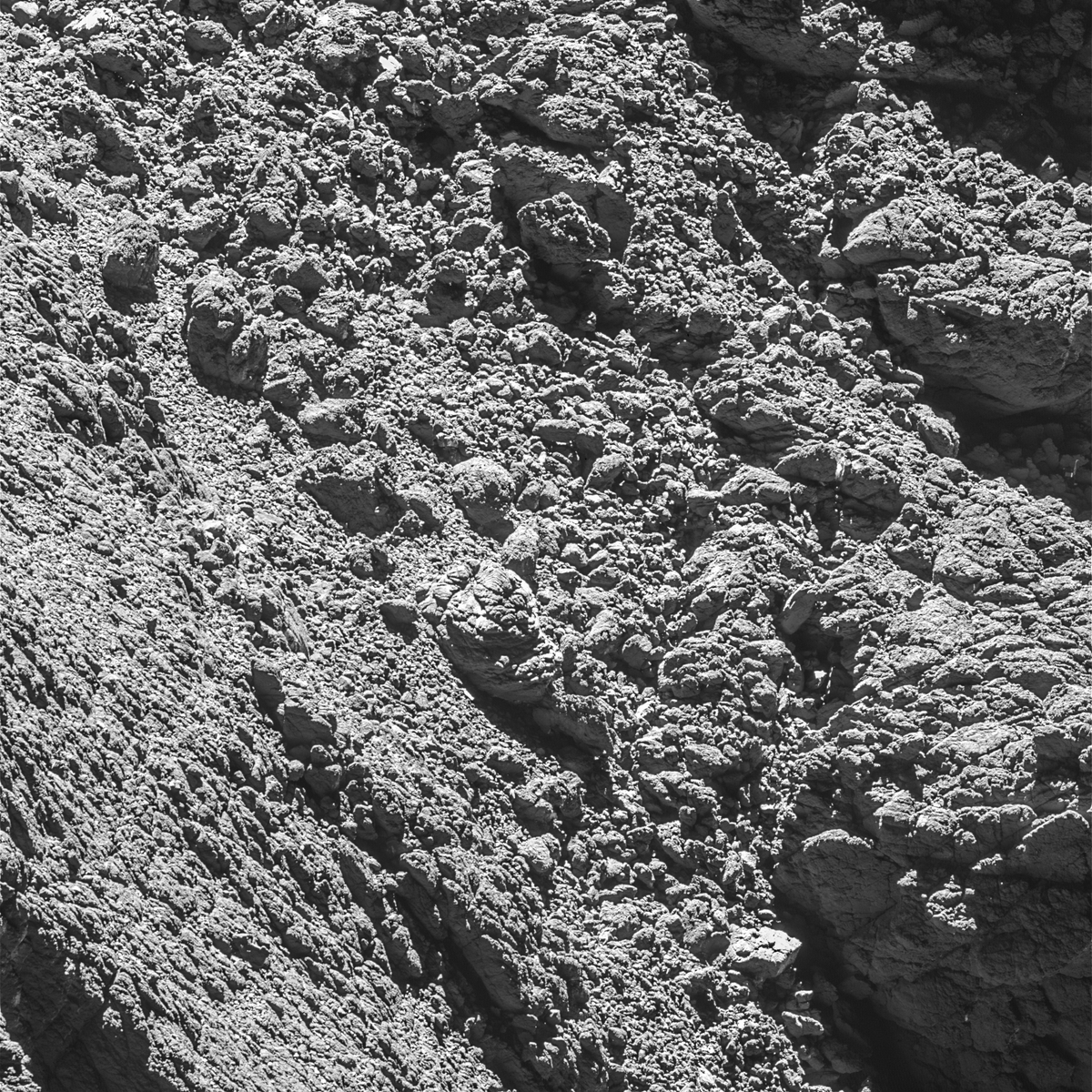 spacegovuk's tweet photo. In September 2016, Rosetta’s camera revealed the #Philae lander wedged into a dark crack on #Comet67P. ☄️

The images were taken by the OSIRIS narrow-angle camera as the orbiter came within 2.7 km of the surface. 📷

Can you spot Philae in this picture? https://t.co/jeNPxjhmjE