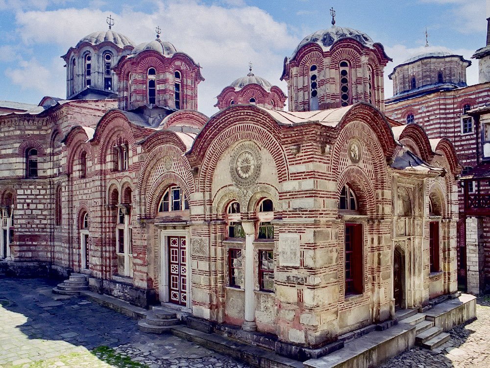 DecaniMonastery's tweet photo. Saint King Stefan Milutin (r. 1282–1321), one of the most renowned rulers of medieval Serbia, is celebrated not only for his political and military achievements but also for his profound contributions to the Serbian Orthodox Church. Here are some of his key accomplishments for the Church:

1.Extensive Church Building and Restoration:

•King Milutin is credited with building and restoring over 40 churches and monasteries, more than any other member of the Nemanjić dynasty. His projects spanned the entire Balkan region, from Serbia to Kosovo and even into the Byzantine Empire, reinforcing Orthodoxy across the region.

Some of his most notable foundations include:
•Banjska Monastery: Built as his intended mausoleum, Banjska Monastery was richly decorated and became a center of spiritual life.
•Gračanica Monastery: Located in Kosovo, Gračanica is one of the finest examples of Serbian medieval architecture and is now a UNESCO World Heritage site.
•The Church of the Holy Virgin Ljeviška in Prizren: Milutin rebuilt and expanded this ancient church, which is also now a UNESCO World Heritage site.
•Hilandar Monastery on Mount Athos: Milutin provided significant funding for renovations and added new structures to this revered Serbian monastery.

2.Expansion of the Serbian Church’s Influence:
•By expanding and renovating churches and monasteries across the region, Milutin helped spread and strengthen the presence of the Serbian Orthodox Church. His patronage and building projects supported the Orthodox Christian identity of the region, especially in territories that bordered or were influenced by the Byzantine Empire.
•His contributions to the Monastery of Hilandar strengthened ties with Mount Athos, making the Serbian Church an integral part of the broader Orthodox Christian world.

3.Development of Serbian Ecclesiastical Art:
•Under Milutin’s patronage, Serbian medieval art flourished. His commissioned works feature some of the finest examples of Byzantine-inspired frescoes and iconography, blending Byzantine and local Serbian styles.
•The frescoes in Gračanica Monastery and the Church of the Holy Virgin Ljeviška are prime examples of this cultural and artistic patronage, showcasing the sophisticated theological and artistic vision encouraged by Milutin’s reign.

4.Strengthening Relations with the Byzantine Empire:
•Through his marriage to Simonida, the daughter of the Byzantine Emperor Andronikos II Palaiologos, Milutin solidified political and ecclesiastical ties with Byzantium. This alliance brought closer cultural and theological exchanges between the Serbian and Byzantine churches.
•His support of Byzantine Orthodox practices and iconography influenced Serbian ecclesiastical traditions, making them even more aligned with the rest of Orthodox Christendom.

5.Canonization and Ongoing Veneration:
•Milutin was canonized by the Serbian Orthodox Church just a few years after his death, in 1324, due to his pious life, contributions to the Church, and dedication to Orthodoxy.
•His relics, preserved at the Church of Saint Kyriake in Sofia, Bulgaria, are a site of pilgrimage, and his feast day (celebrated on October 30/November 12) is a reminder of his enduring legacy for the Church. His legacy remains a point of unity and reverence between the Serbian and Bulgarian Orthodox Churches.

King Milutin’s legacy is characterized by his dedication to building and strengthening the Serbian Orthodox Church, not only through physical structures but also through his political alliances, cultural patronage, and deep spiritual commitment. His reign is seen as a golden age for the Serbian Church, one that laid the foundation for the spiritual and cultural prosperity that would continue in the centuries to follow.

Hilandar Monastery in Mount Athos, Holy Virgin of Ljevish in Prizren, Gračanica }Monastery, reconstruction of the Banjska Monastery at its heyday. Some of Milutin's greatest achievements.