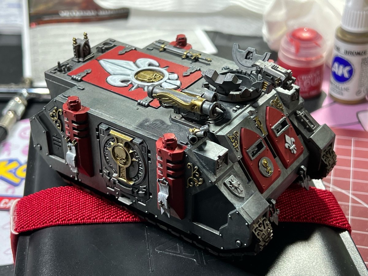 mayobukkake's tweet photo. Very first pass of color on one of my Inquisition/Sororitas Rhinos. Lots more to do obviously but I’m just testing the color scheme. https://t.co/PhA50vrZJG