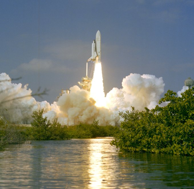 With a waterway in the foreground, and framed by Florida vegetation, space shuttle Columbia lifts off from Launch Pad 39A at NASA's Kennedy Space Center on November 12, 1981. Astronauts Joe H. Engle and Richard H. Truly were the crew for the second space shuttle (STS-2) flight.
