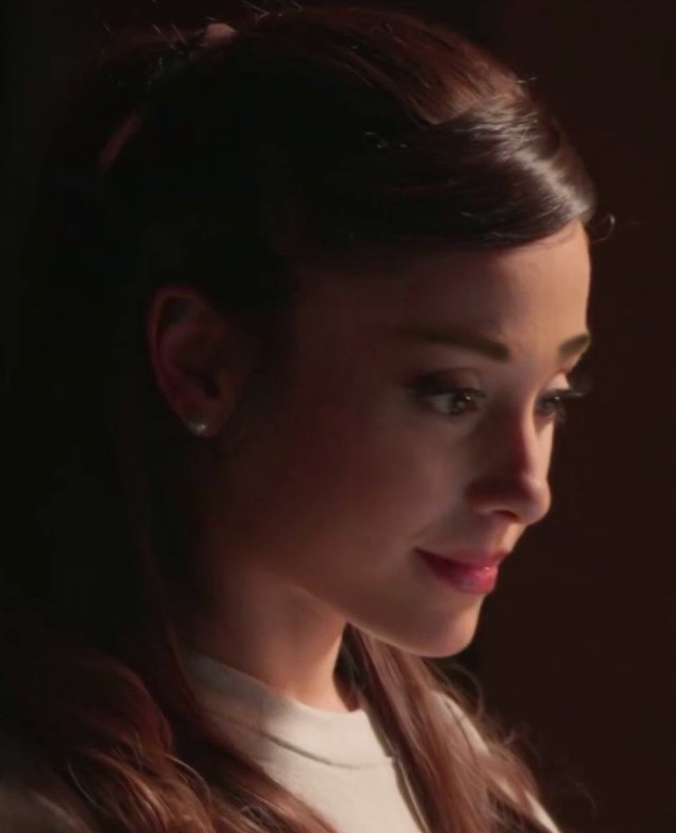 she looks like her heart is stuck in a bumper-to-bumper traffic