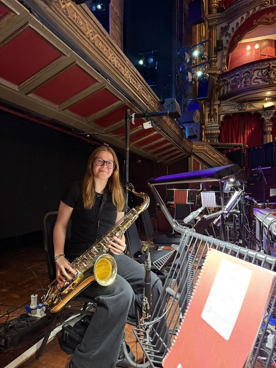 Izzy is having another busy week after playing clarinet in our band for Oklahoma last week! She has been booked to play clarinet and saxophone for Calamity Jane alongside other professional musicians in the Grand Opera House. What a star! Here she is playing saxophone!
