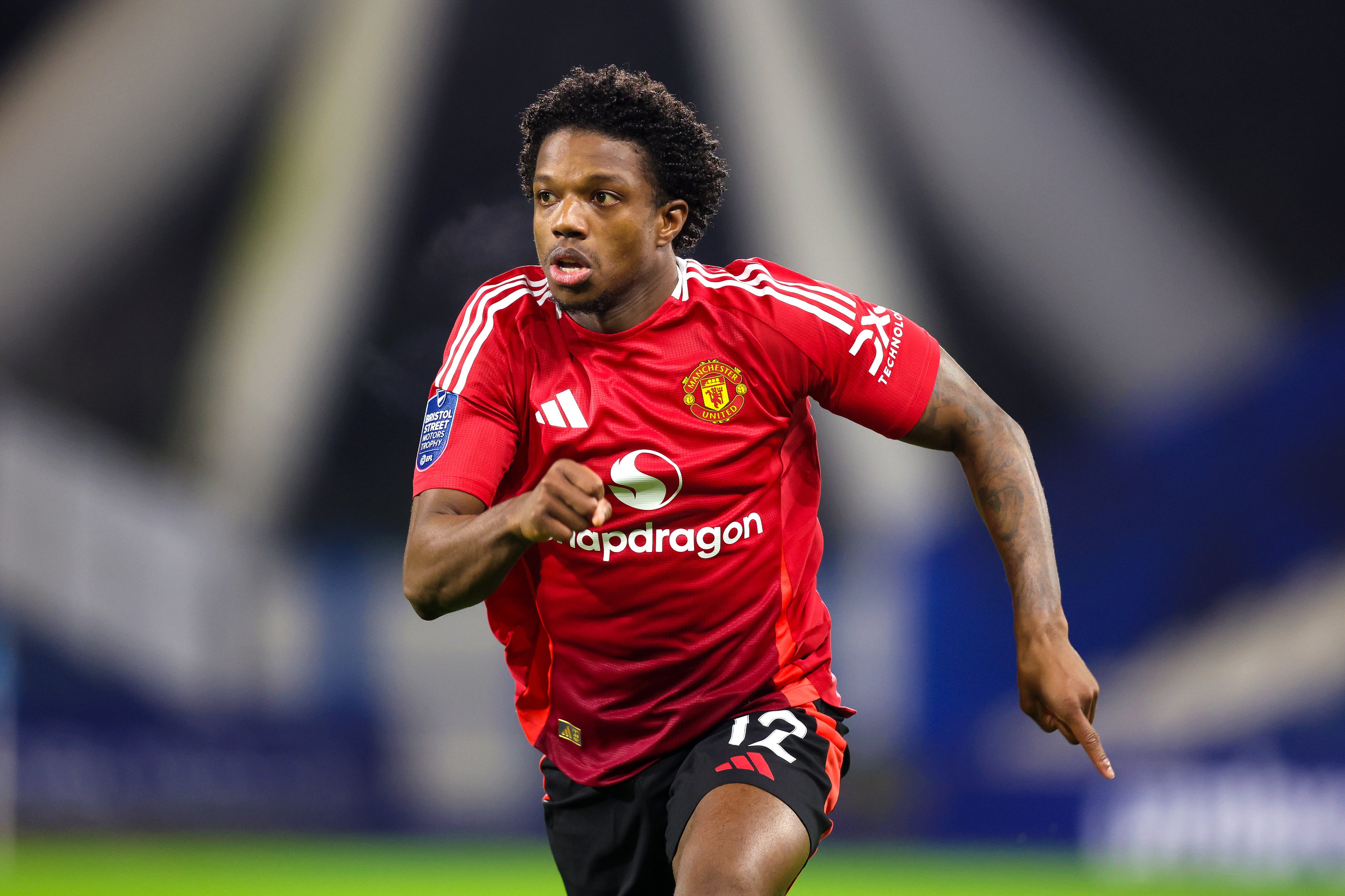Tyrell Malacia runs during United U21s v Huddersfield in the EFL Trophy.