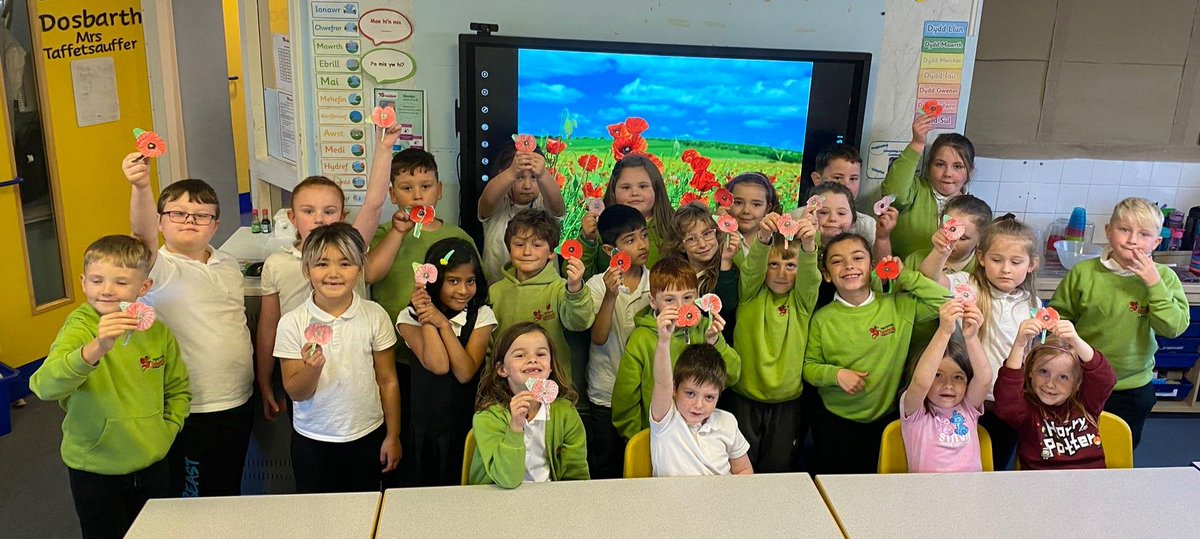 Our year 3 class showing their poppies for Remembrance 🏵️
