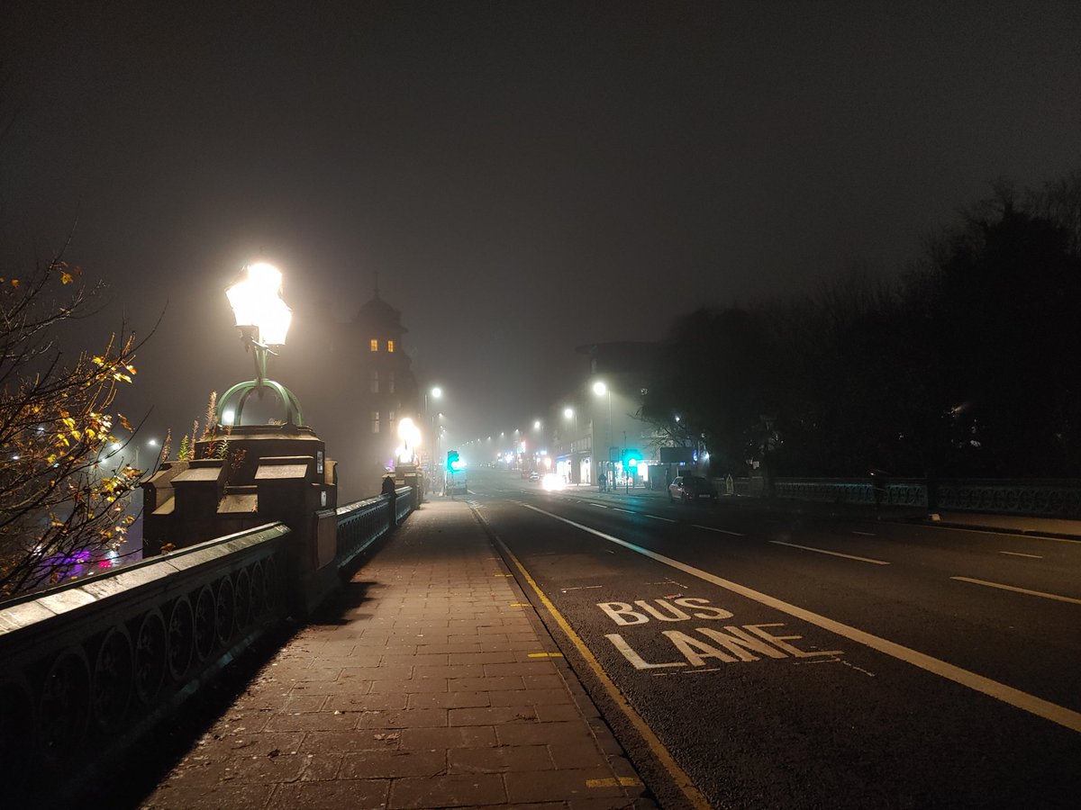 The weather tonight is "our hero is in lonely contemplation, neon signs flying past"