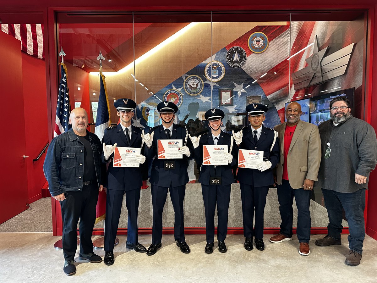 Rackspace's tweet photo. Today, we unveiled our new #RackVet Wall at HQ! 🇺🇸 With the posting of the colors from @UTSA students, remarks from RackVet sponsor Brian Lillie, and insights from Chair Percy Espinoza, we honor our veterans and their families.

#RackerLife #LifeAtRackspace https://t.co/Vu4r9qbJho