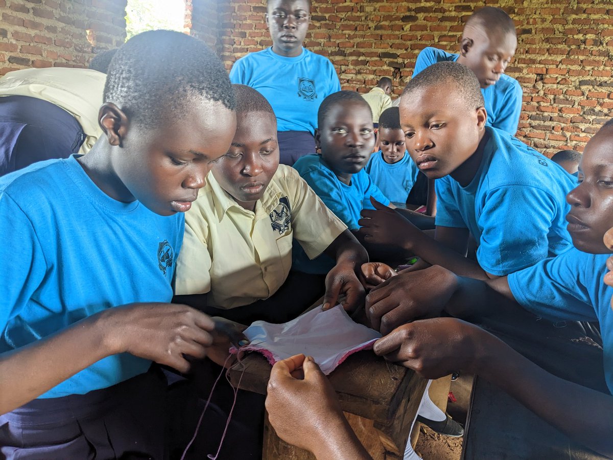 PriceyMS's tweet photo. Solara at Bulamajji Community SS Iganga- Girls learnt  how to make reusable sanitary pads, partnered with KDI fund  to provide both reusable and disposable pads and had open discussions on menstrual health. Empowering them with tools and knowledge—a step toward lasting change https://t.co/VlqU4BuaES