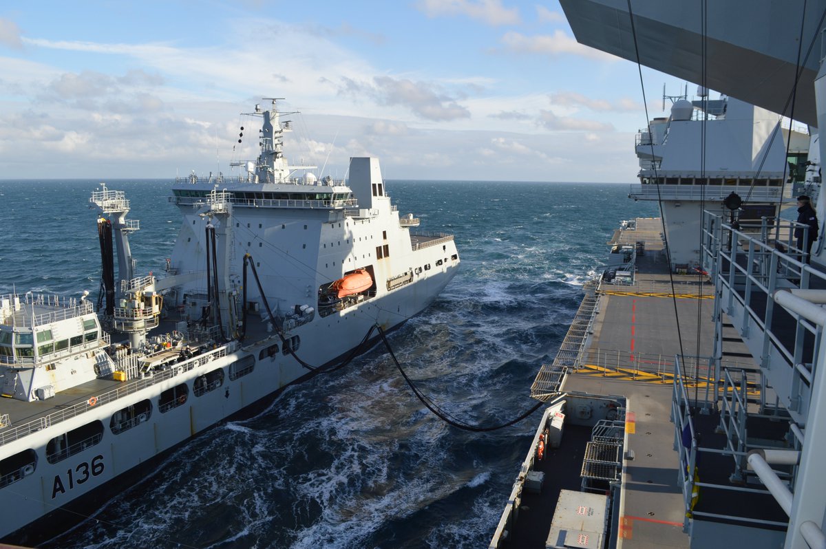 NavyLookout's tweet photo. .@HMSQNLZ conducts Replenishment at Sea with @RFATidespring this morning