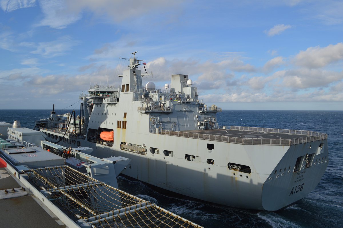 NavyLookout's tweet photo. .@HMSQNLZ conducts Replenishment at Sea with @RFATidespring this morning