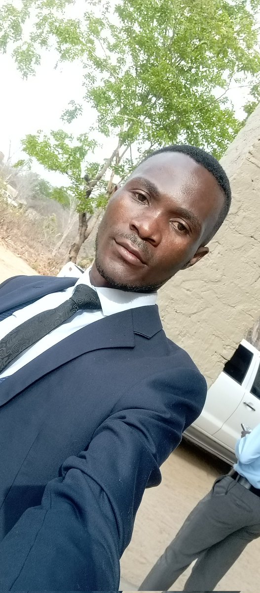 5:00Am view of Gwango. 
Proud farmer in suits.