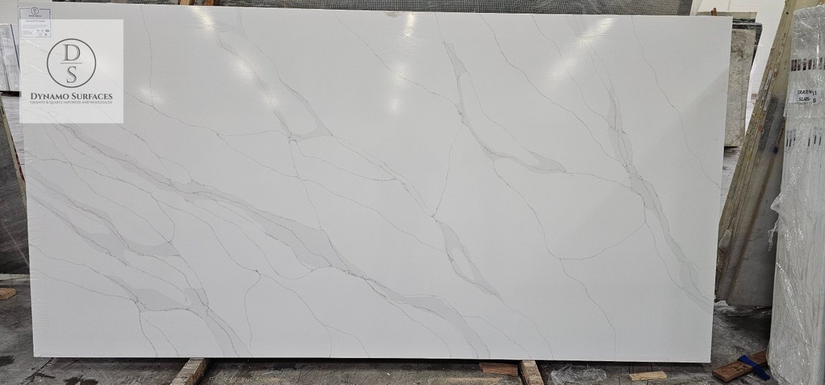 DynamoSurfaces's tweet photo. Our Calacatta Aura slab brings sophistication to any setting with its elegant white base and subtle gray veining. Perfect for a luxurious, modern aesthetic, this slab is a timeless choice for kitchens, bathrooms, and more! #QuartzSlab #LuxuryInteriors #ModernDesign https://t.co/nC8PfRFRM6