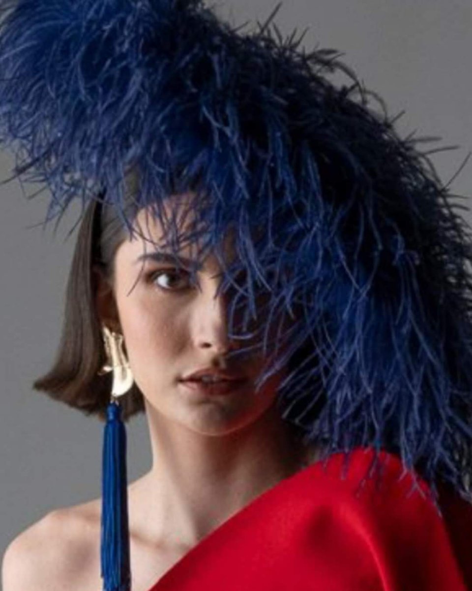 What a hat <a href="/grainnemaher/">Gráinne Maher</a> what an image <a href="/pmchugh_digital/">Patrick McHugh</a> Come to Belfast this Sunday to see <a href="/grainnemaher/">Gráinne Maher</a> <a href="/leonoraferguson/">Leonora Ferguson</a> <a href="/FAOmillinery/">FAO Millinery</a> <a href="/aoifeharrison/">Aoife Harrison</a> and so much more. See you there ….