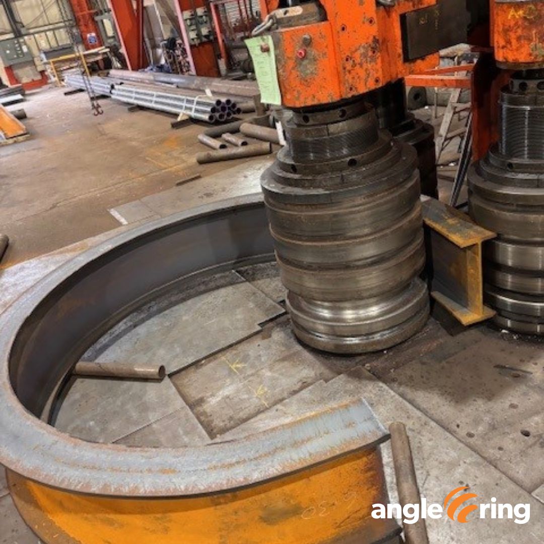 AngleRingCo's tweet image. Take a look at this latest job from the #AngleRing shop floor! We're working on bending a hefty 457 x 191 x 98kg/m UB sections to a precise 1160mm center radius with a 1900mm inside arc.  Learn more about our metal bending services: anglering.com/our-services/ #SectionBending