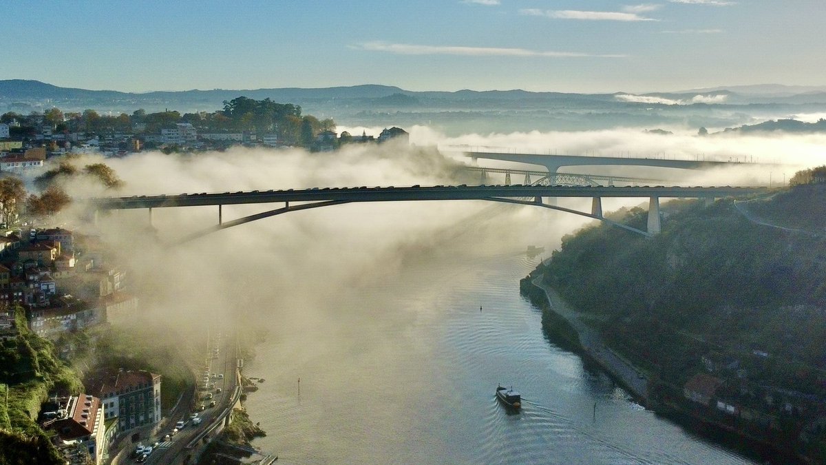 The bridges of Porto in the morning fog. Bird’s eye view from a DJI Mini 4K.
