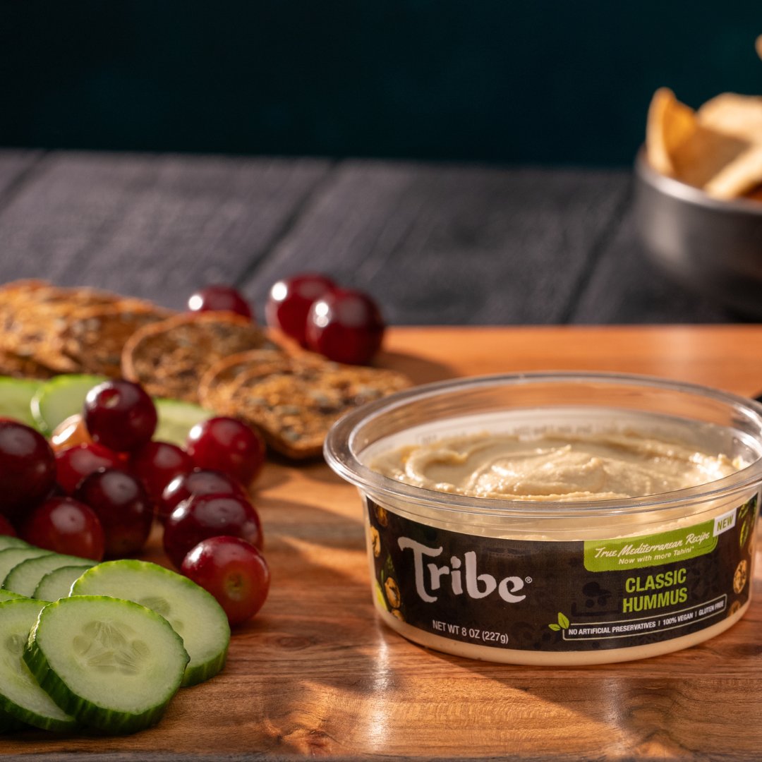 Sometimes, simple is best! You can never go wrong with our Classic Hummus for your snack board. 🍇✨  #Tribe #ClassicHummus #Mediterranean #SnackBoard