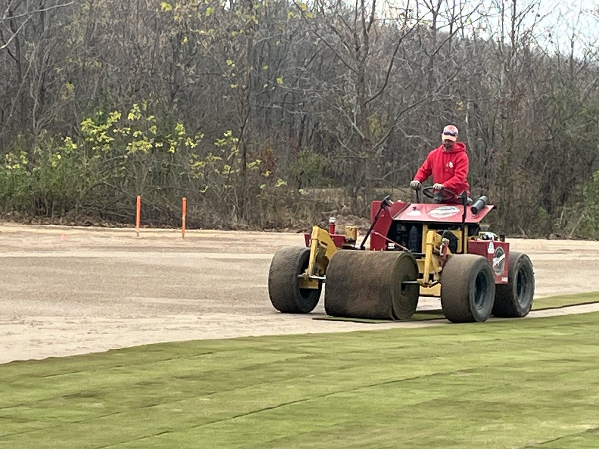 Installing bentgrass sod on green renovation at Osage National Golf Club