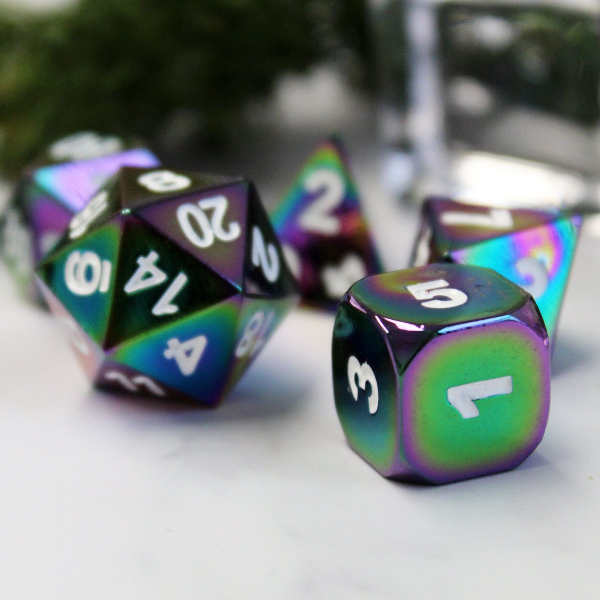 We are excited for the return of the alchemist oil dice collection. This 7-piece set, crafted from metal in a chrome color, is now available again. We've just finished a big metal dice production run and there's a lot of restock happening this week! buff.ly/3CgI7J1