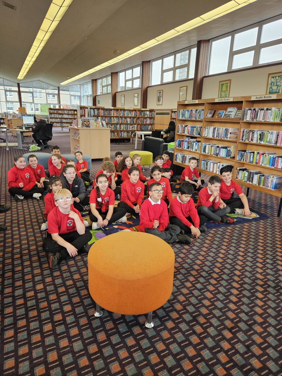 P5a at Knightswood Library today. The children enjoyed exploring fiction and non-fiction collections, and they each got to borrow a book for class. #readingforpleasure  <a href="/CorpusChristi_K/">Corpus Christi PS</a>