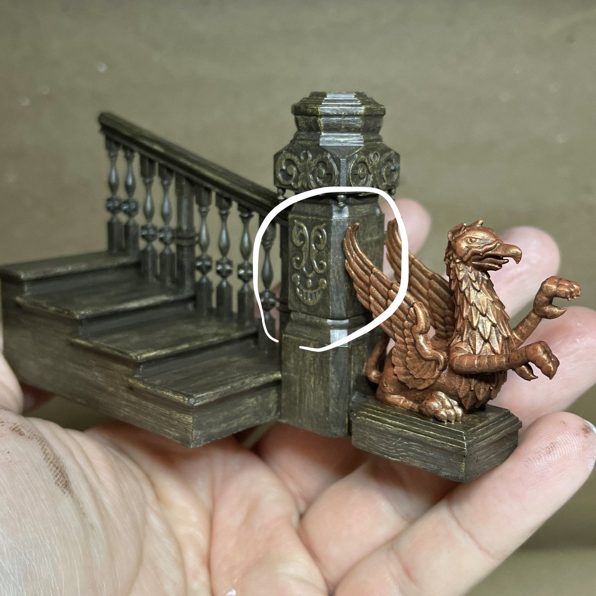 The Mansion’s staircase banister face now makes an appearance over the doorway to the new Disneyland Haunted Mansion gift shop!