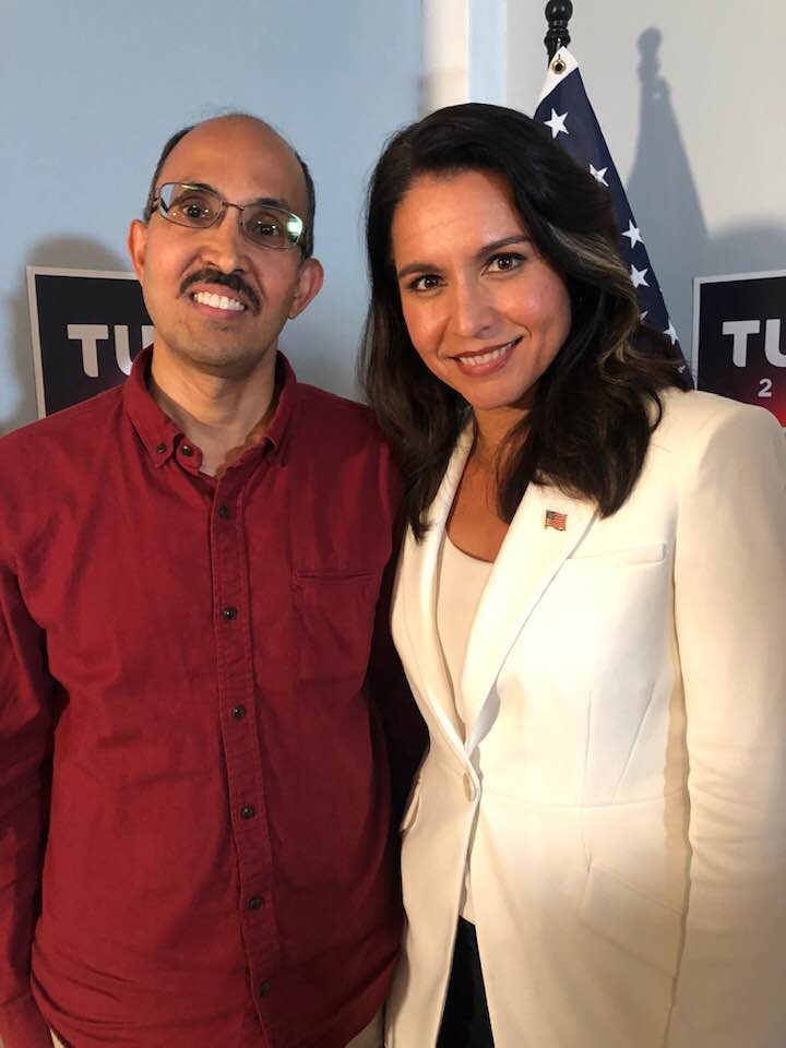 homam108's tweet photo. Congratulations to presumptive DNI (Director of National Intelligence) of US, @TulsiGabbard!

I've followed & admired her since Feb 2016, when she resigned as DNC Vice Chair, to protest DNC's pro-Hillary machinations.

The Military-Industrial Complex nearly destroyed her due to her anti-Hillary stance. They ran so many smear campaigns (e.g. misrepresenting Bashar al-Assad meeting, Russian agent smear etc). It is heartening to see her rise again in such a short time after MIC, MSM & DNC colluded to suppress her in 2020 Dem primaries!

Photos are from 2019 Navaratris, from one of her campaign events in NH. The room had an equal number of Democrats, Republicans & Independents, though it was a Democratic primary event!

I am a registered independent & dislike most US politicians (of both parties). She's a rare US politician I actually love. I admire her fearlessness, honesty, common sense, eloquence & integrity. Being an unapologetic Hindu (and Krishna devotee!) sweetens it further. 🙏

More power to you Tulsi!