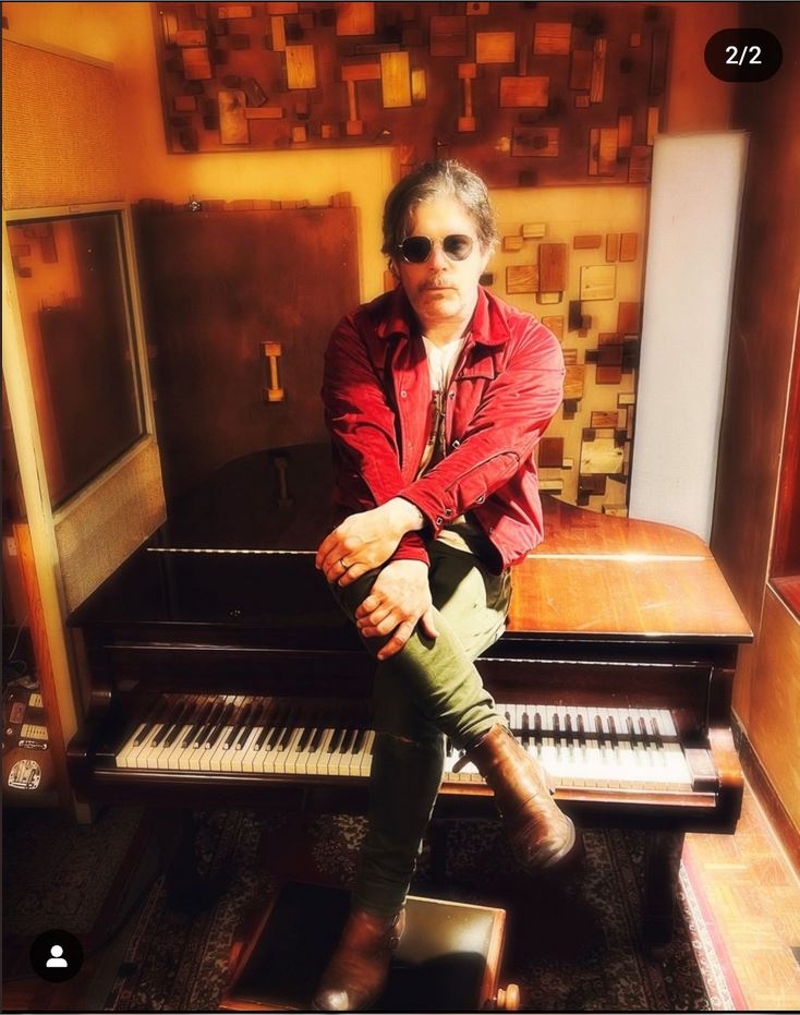 Ooo I love the one of Ed on the piano. I wish there were more photos.