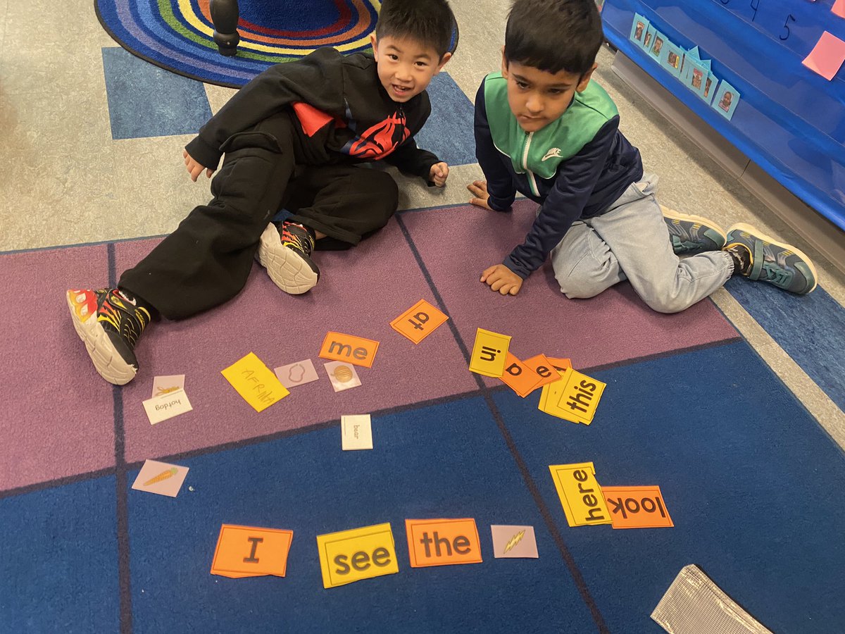 Using our snap word cards to make sentences with phonics partners