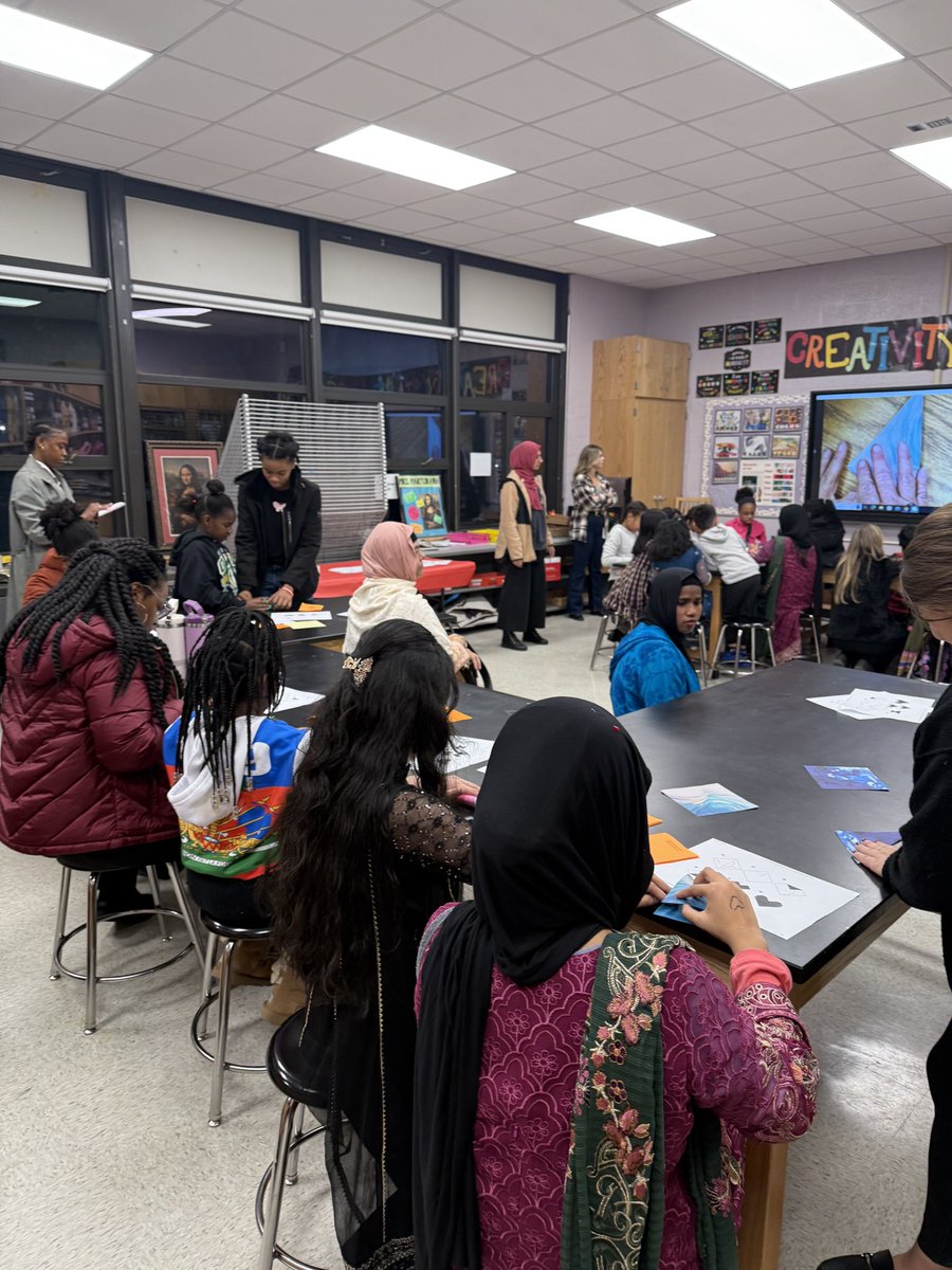 One of the many stations at our annual Multicultural Night! Students and family members learned how to fold origami. #happeningathowell