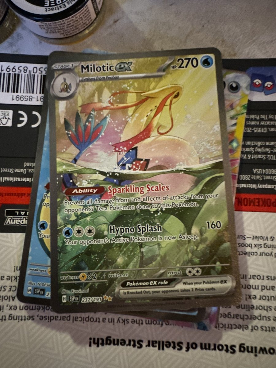 RogueCardsDon's tweet photo. Not sure who else collects @Pokemon but I just picked up a booster pack for #SURGINGsparks and I pulled a FRICKEN BANGER!!! #MiloticEX #Pokemon #TCG #catchemall I am so excited about this pull. On the way to PSA! @CardPurchaser https://t.co/JIPk8v1NDp