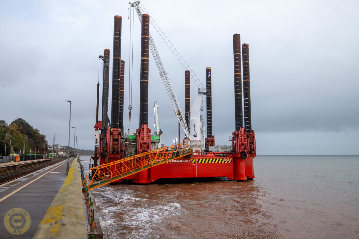 CoastCams247's tweet photo. Four years ago, the #WaveWalker arrived in #Dawlish to start the piling for phase two of the #DawlishSeaWall. It's an eight-legged, self-contained, walking jack-up platform that helped install the 16-metre piles along the 415-metre sea wall section, Phase 2. https://t.co/OEQKykklcO