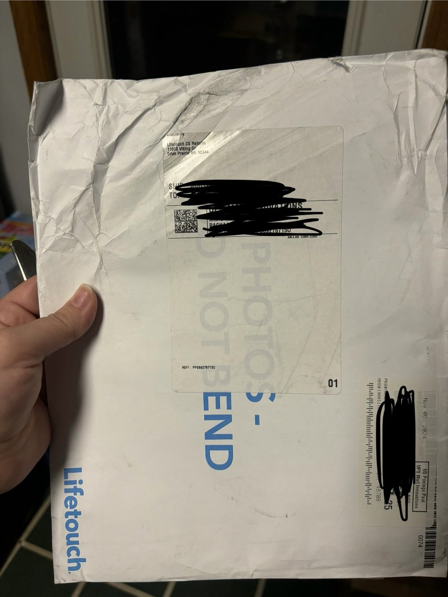 theGemini_Jay's tweet photo. @Lifetouch @USPS I don’t know who put the shipping label directly over the instructions NOT to bend the envelope, but my son’s photos are definitely bent. https://t.co/ZvtHqKCkr1