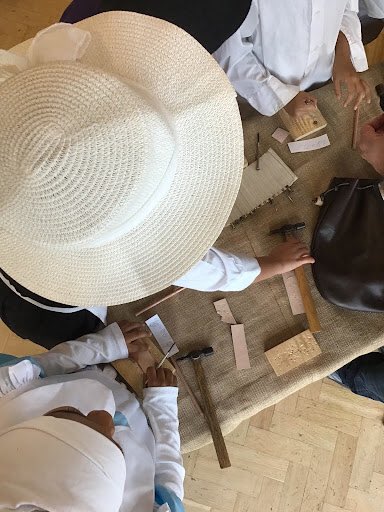 Stepping back in time, our Year 2 children embarked on an immersive journey during the ‘Great Fire of London’ workshop. Dressed in authentic 1666 attire, they transformed into weavers, metal workers, chandlers, bakers and leatherworkers.