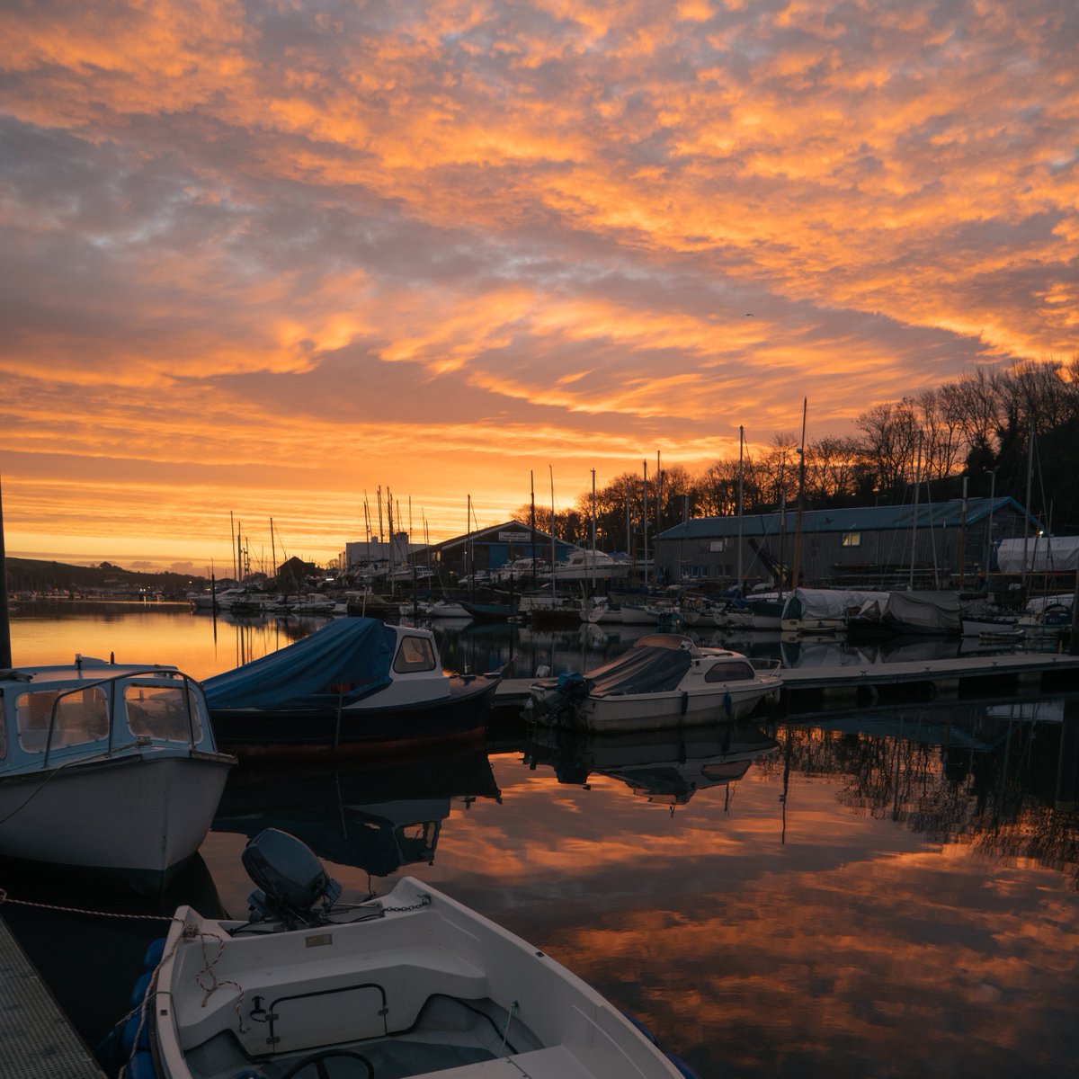 Sunsets over #Penryn painting the sky orange. 🌇

The way the sun reflects on the water adds an extra layer of beauty to our evenings and serves as a delightful view while enjoying an evening drink.