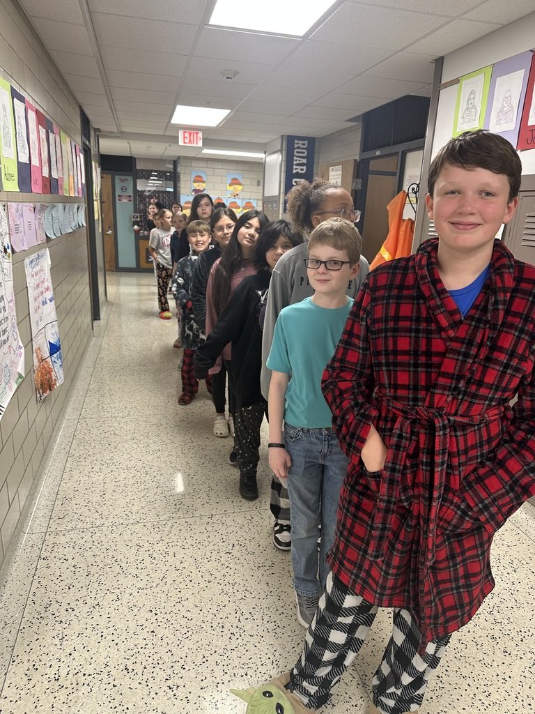 Halverson's fifth grade students earn special coupons for increasing their IXL scores during progress monitoring. Today the student earned Pajama Day for his class.