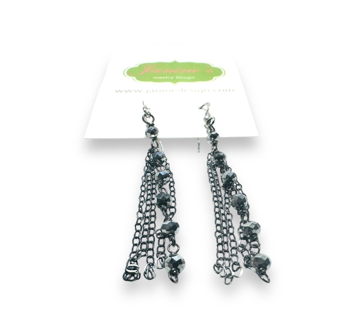 A little over 2” long, these stunning “hematite” color crystals are wrapped into a chain with silver plated wire. Sterling silver darkened chain is also attached to the sterling silver earwires. 

$28