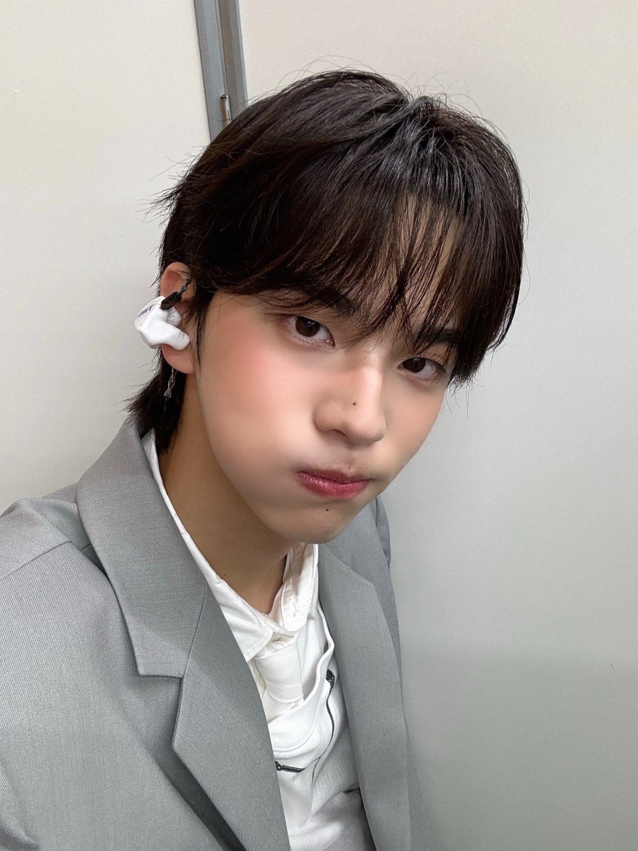 Feelin' fly with the fit, ready to rock the world with these vibes. Got the earbuds in, jammin' to my fave beats, keepin' it real. The glow's on point, no filter needed, just natural swag.